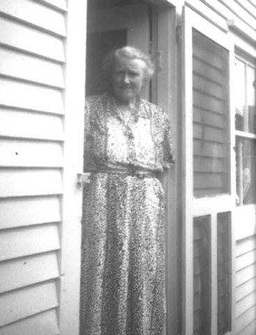 266: Julia (Reddy) McCarthy in her doorway.  - daughter of James Reddy &amp;amp; Mary Anne Murphy
